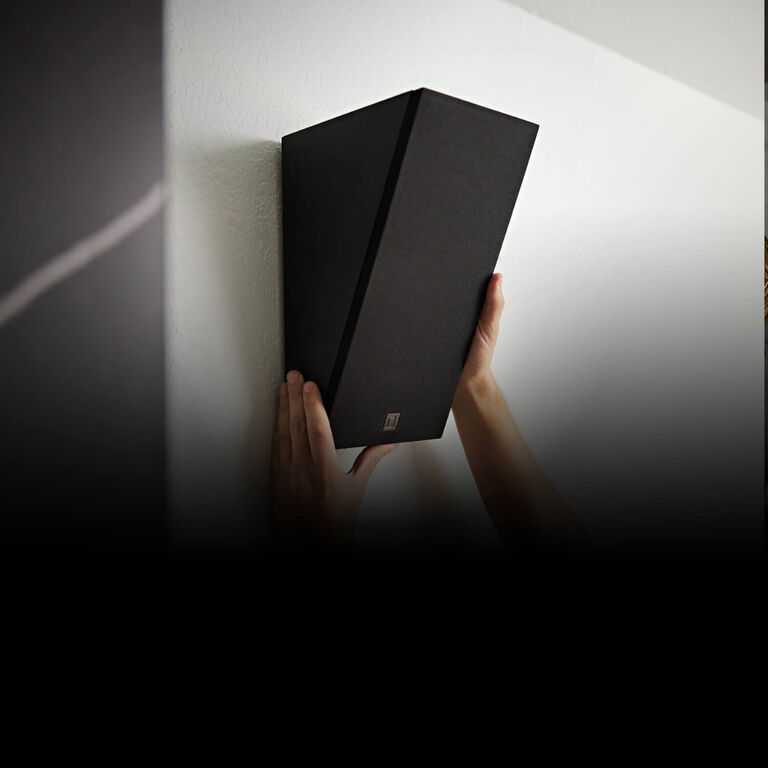 Surround speaker on white table